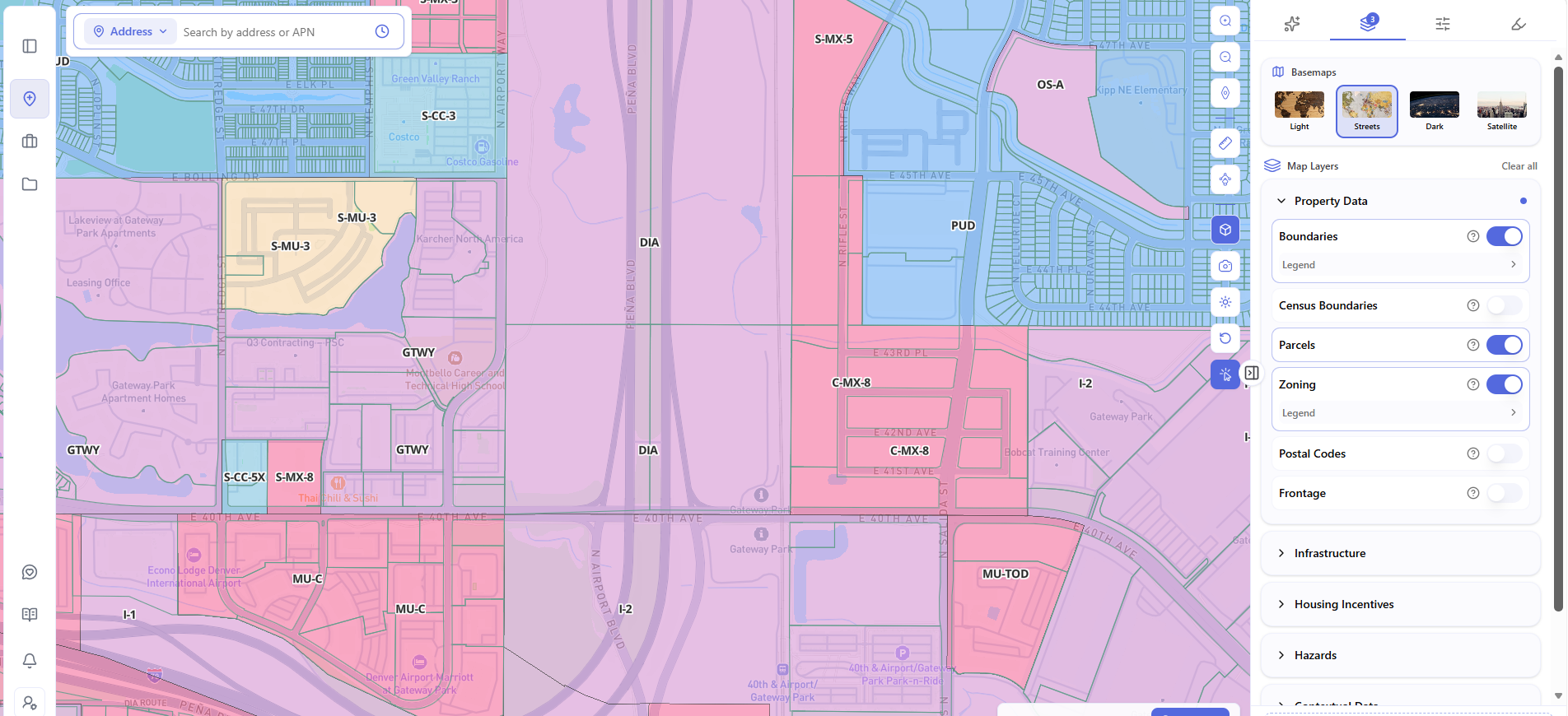 Archiwise map of a mixed-use area near Denver's Gateway Park, with the Property Data layer group open showing Boundaries, Parcels, and Zoning toggled on.