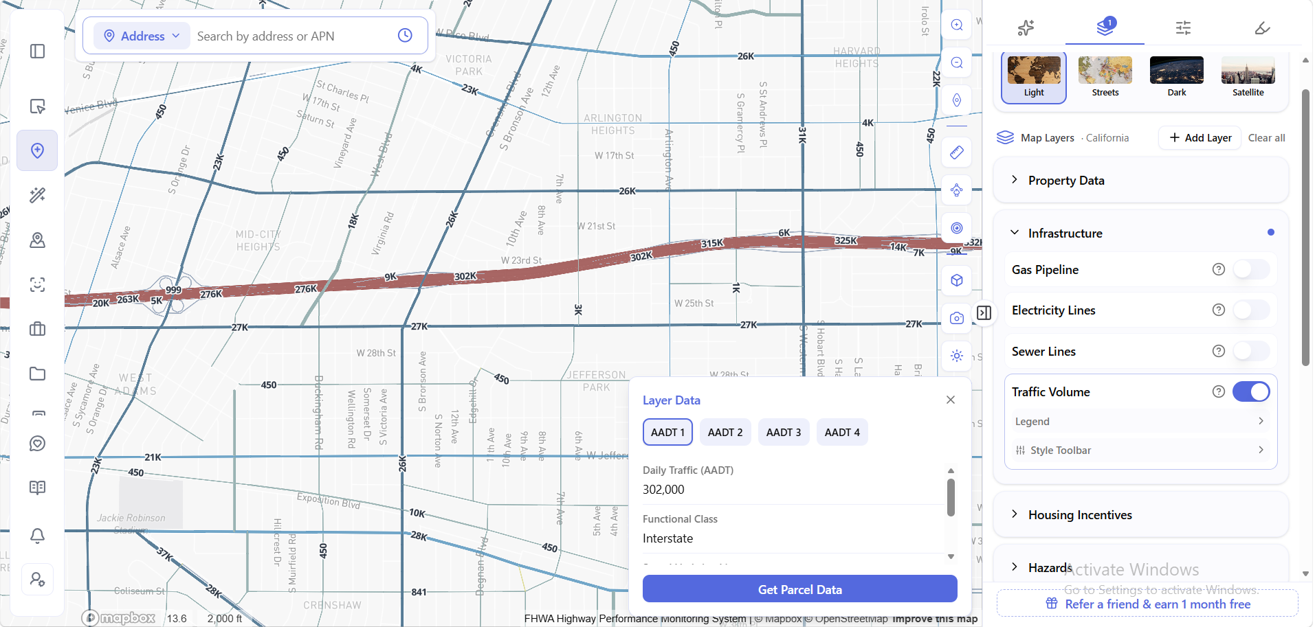 ArchiWise Traffic Volume map layer along an interstate corridor in Los Angeles, with a popup showing daily traffic count and road functional class.