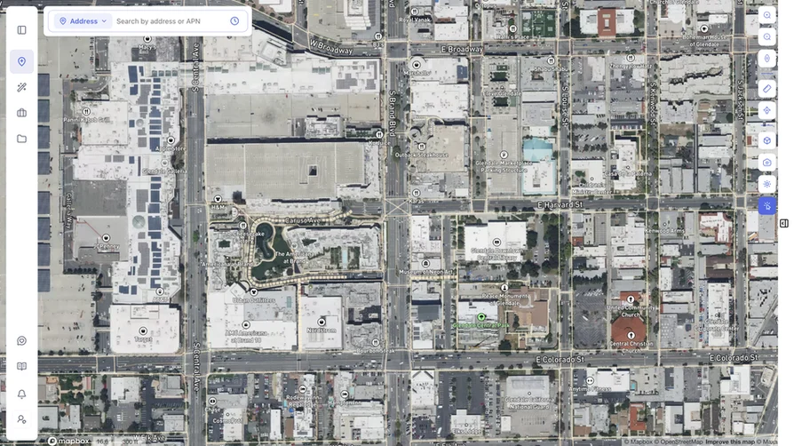 ArchiWise hybrid basemap showing satellite imagery with street labels over a city block